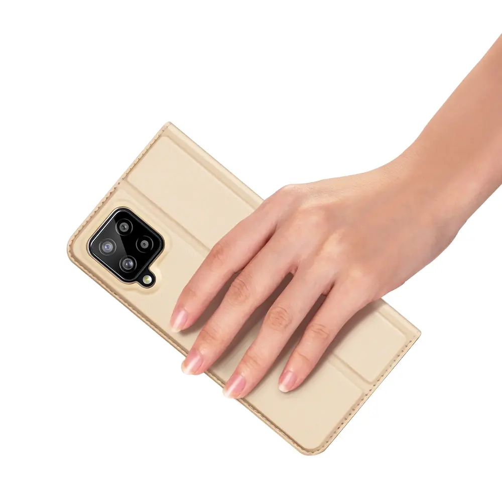 Prémiové flipové pouzdro DUX DUCIS SKIN na mobil Samsung Galaxy A22 4G zlatavé