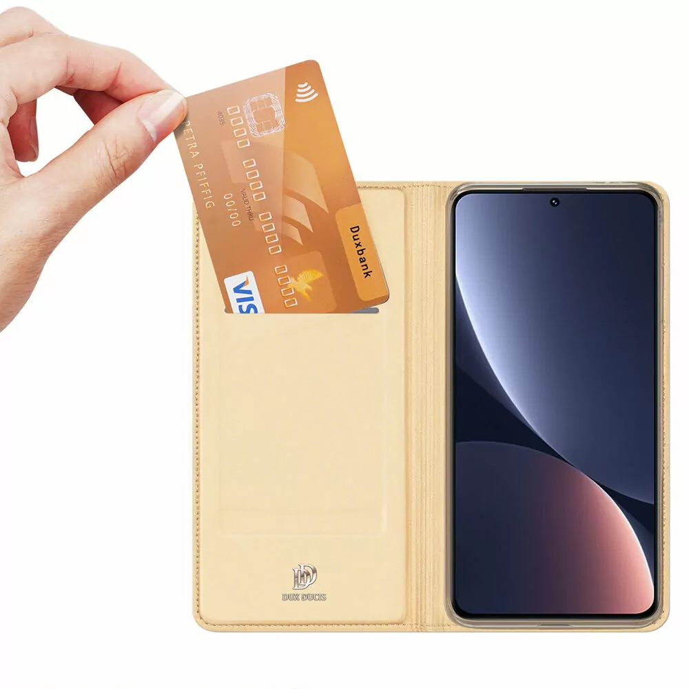 Prémiové flipové pouzdro DUX DUCIS SKIN na mobil Xiaomi 13 - zlatavé